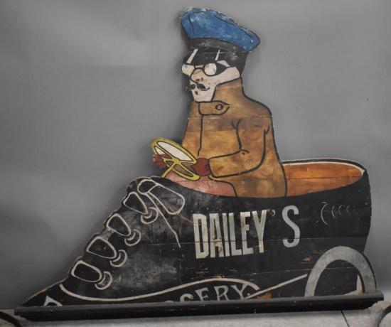 Dailey's Man Driving A Shoe Wood Sign