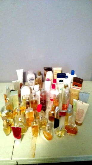 Large lot of perfumes lotions and more