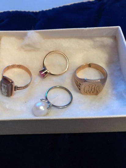 Four vintage rings unmarked