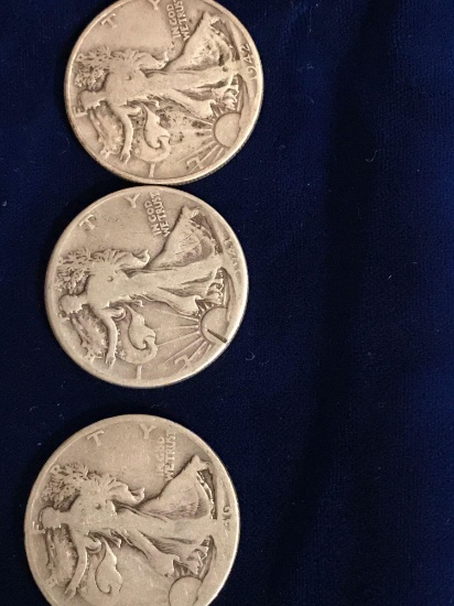 Seven liberty half dollars