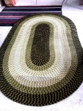 Green braided rug