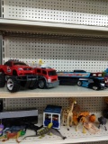 Kid toy trucks and zoo animals