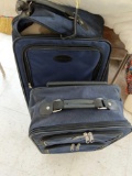 Assortment of luggage and duffle bags