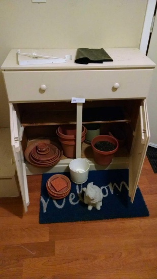 36 by 15 inch cabinet with contents