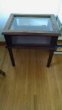 Glass lift top end table