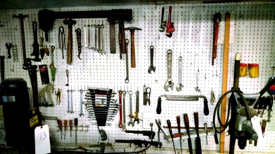 Assorted tool lot on back wall