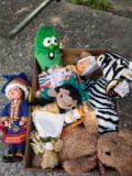 Assortment of stuffed animals and Dolls.