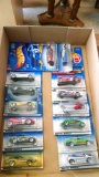 14 Hot Wheel cars on cards