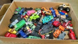 Box of assorted toy cars