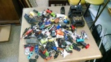 lot of toy cars and trucks including Golden Eagle Jeep