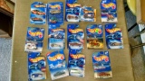 14 Hot Wheels cars on cards