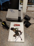 Nintendo console, misc cables, Zelda book