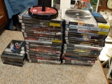Assortment of PS1 and PS2 games. 2 memory cards