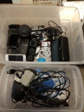 Lot of assorted cell phones, cords, flash drives, mp3 players