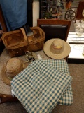 Straw hats, wicker basket, chair cushions, desk light