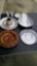 Assorted plates made from glass, wood, and aluminum see pics