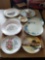 Assortment of decorative plates and sugar dish