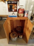 Wooden 2 door cabinet with coffee maker, bathroom vent, can opener, cooler, pots and pans