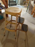 Metal stepping stool in basement