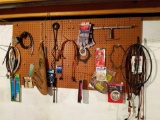 Wall of misc supplies in basement