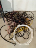 Assortment of extension cords and bungee cords