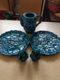 Decorative ceramic plates, shakers, and tea pot