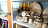 Shelf of dishware and glassware