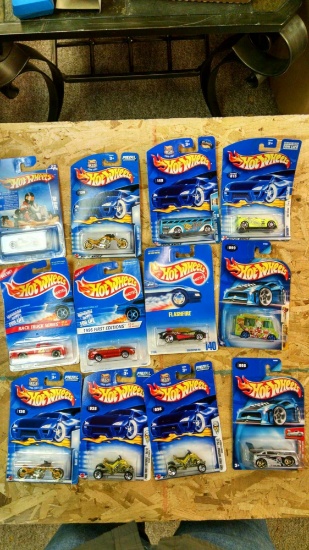 12 Hot Wheels cars new on cards