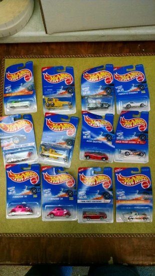 12 Hot Wheels cars new on cards