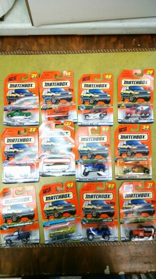 12 Matchbox cars new on cards