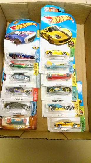 12 Hot Wheels cars new on cards