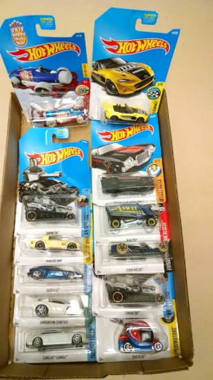 12 Hot Wheels cars new on cards