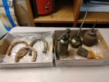 Vintage torch, oil cans, and horseshoes