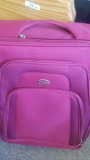 Large pink suitcase