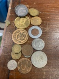 Assorted foreign coins and tokens