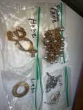 Several pieces of Signed costume jewelry