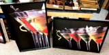 Two 25 inch by 36 inch framed Martini pictures