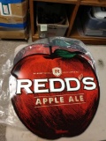 Two Redd's Apple ale metal signs