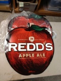 Two reds apple ale metal signs