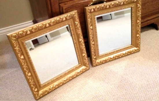 Two 14 inch by 14 inch framed mirrors