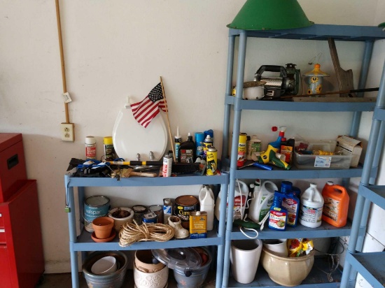 Contents of two shelves including lawn chemicals planters and more