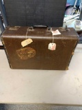 Vintage 18 in suitcase