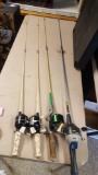 Four fishing poles