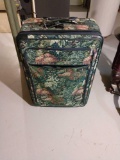 Large floral piece of luggage