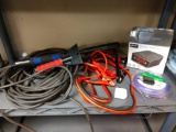 Miscellaneous lot including extension cord, jumper cables, and