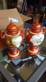 2 porcelain urns