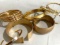 9 Gold colored bangle bracelets