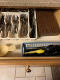 Contents of two kitchen drawers kitchen utensils