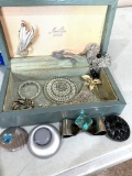 14 Silver colored brooches