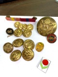 Assorted military pins and buttons